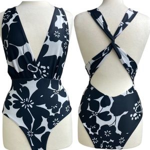Arkitect’s Cala de la Cruz black & white floral swimsuit small
